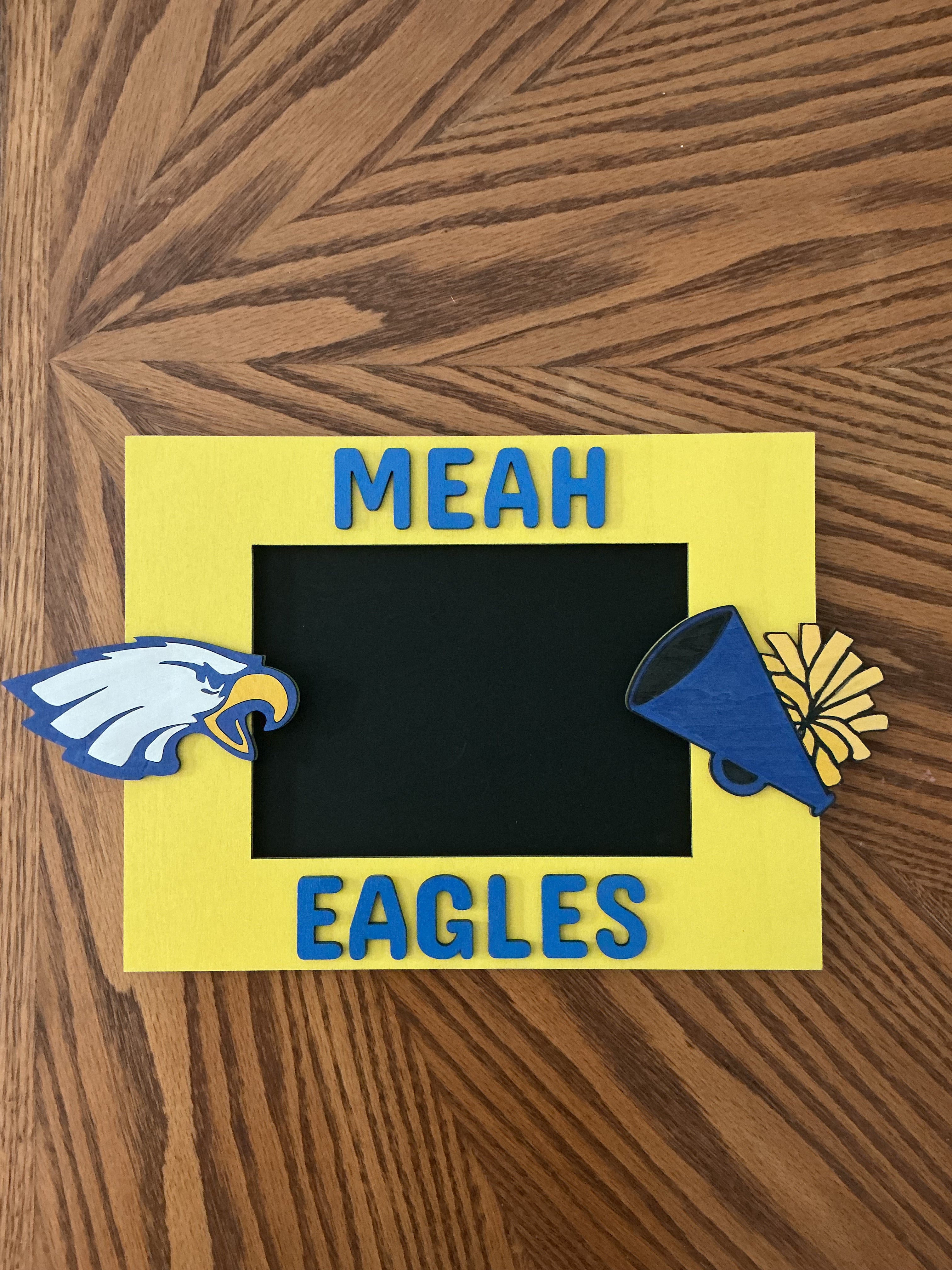 Yellow cheer frame with eagle → "Yellow and blue painted wood laser engraved cheerleading picture frame with eagle mascot"