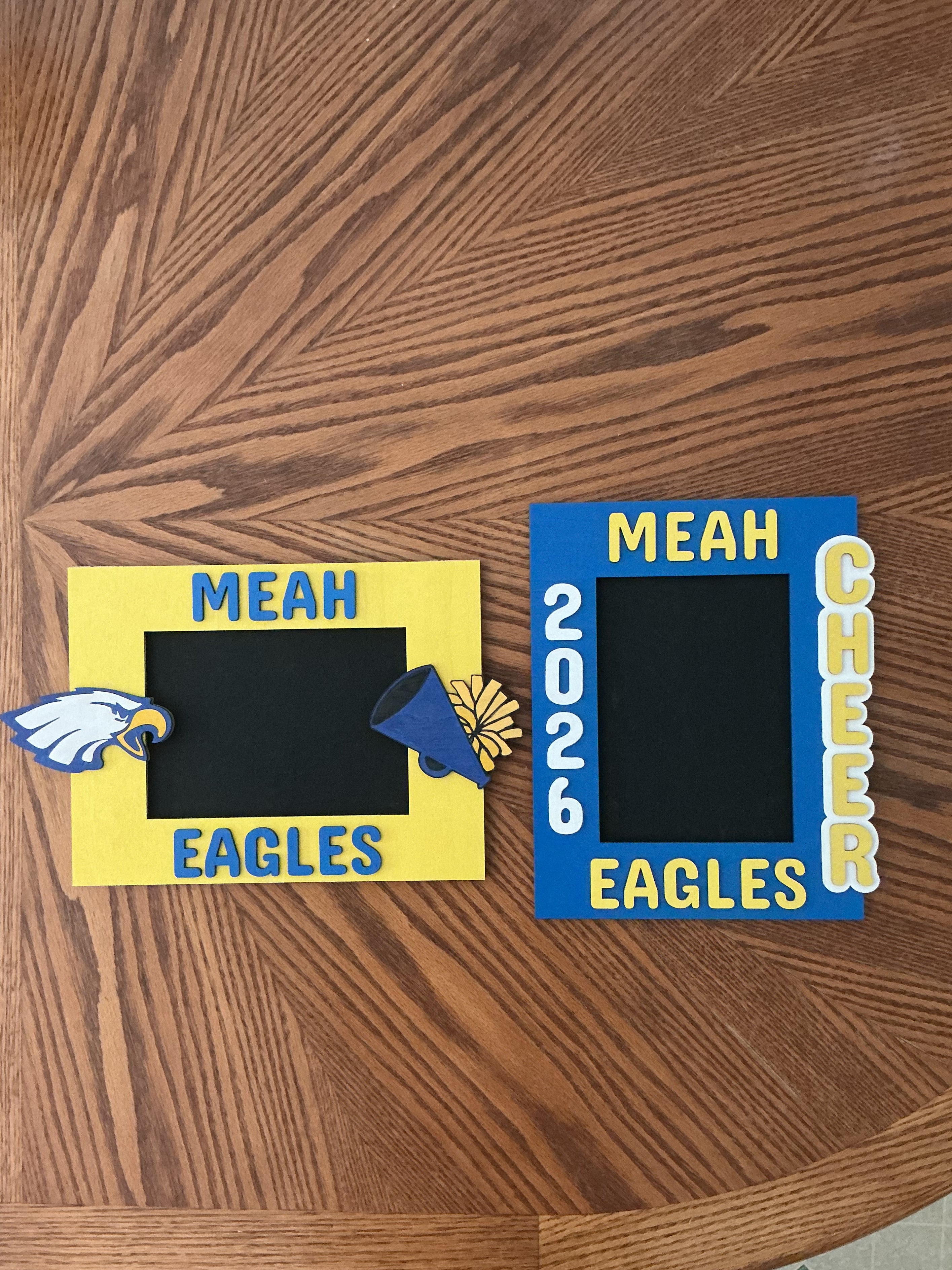 Cheer frames side-by-side → "Custom yellow and blue painted wood laser engraved cheer picture frames comparison"