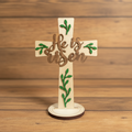 Laser Engraved Wood Cross He Is Risen with stand on rustic wood surface