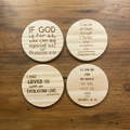 Laser engraved scripture quote wood coasters flat lay on rustic wood surface
